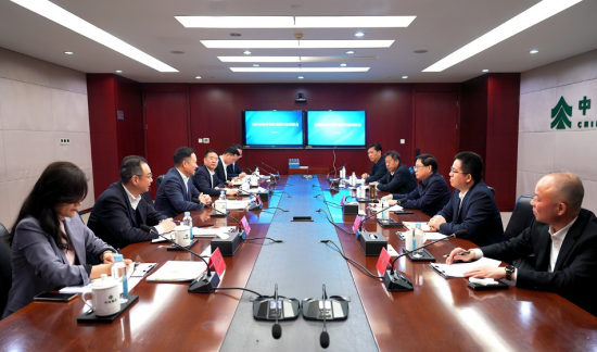 余紅輝會見河南省信陽市委副書記、市長陳志偉一行